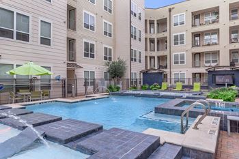 our apartments offer a swimming pool and a patio with umbrellas