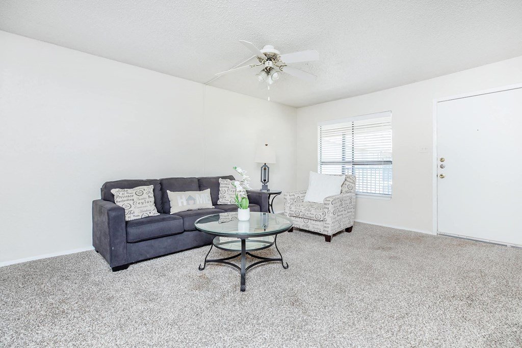 a living room with a couch and a coffee table