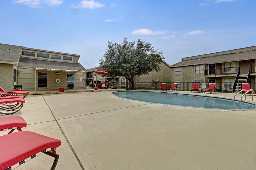 our apartments have a large pool and lounge chairs