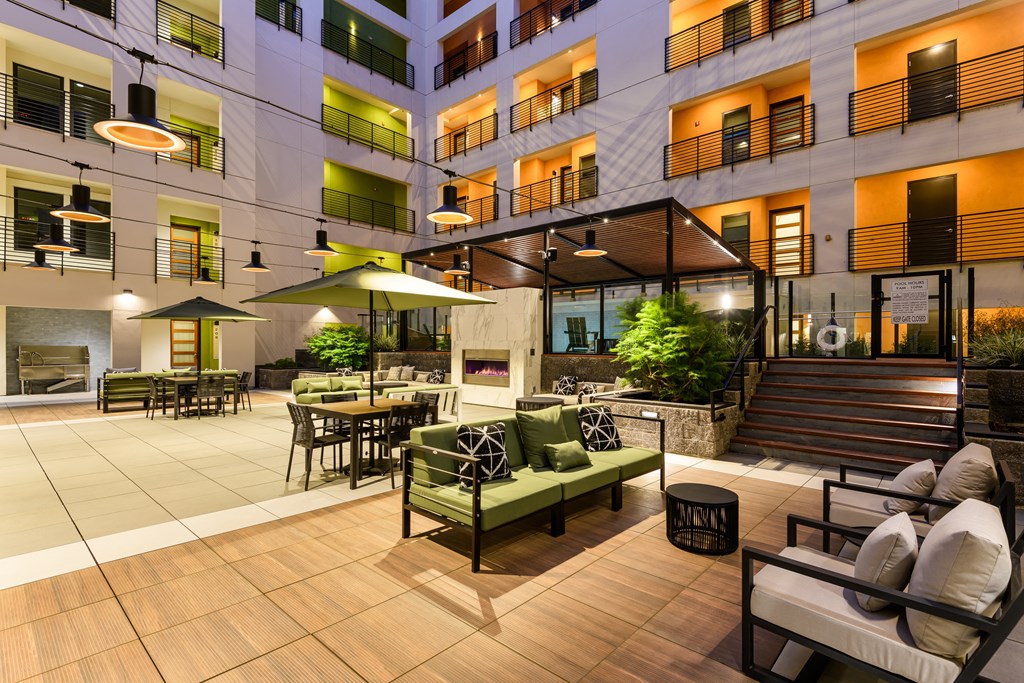 Resident Podium with furniture and umbrellas