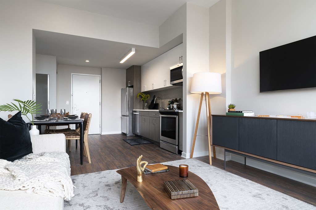 a living room with a couch and a table