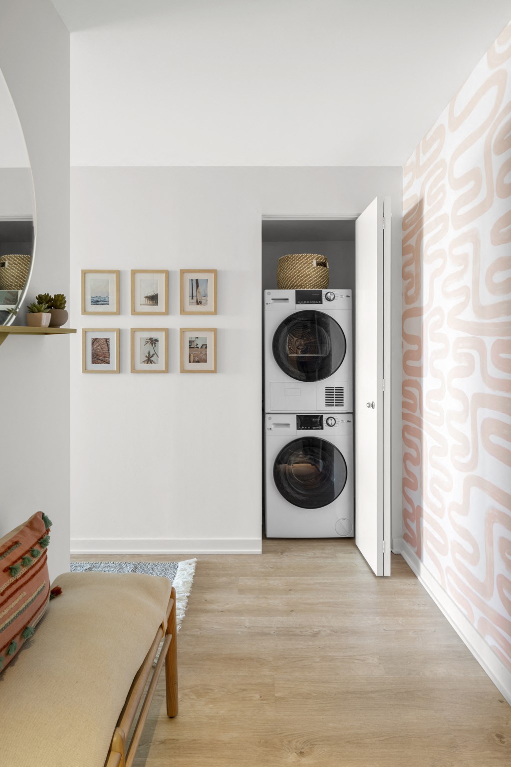 a small laundry room with a washing machine and a dryer