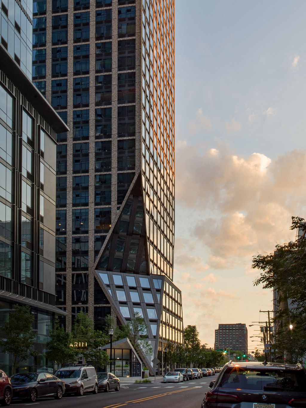 a rendering of a tall building on a city street