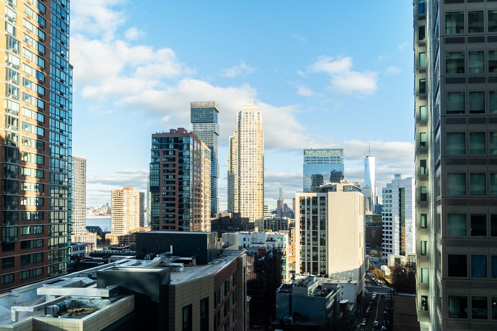 a city skyline with tall buildings and skyscrapers