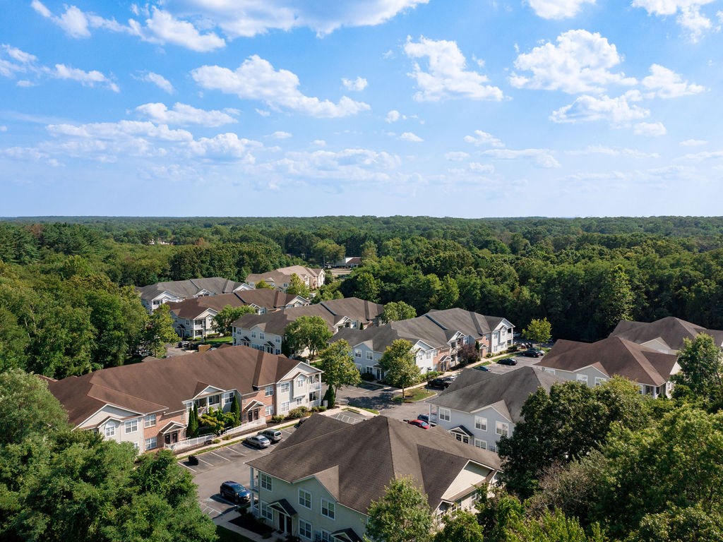 a aerial view of a neighborhood with houses and trees