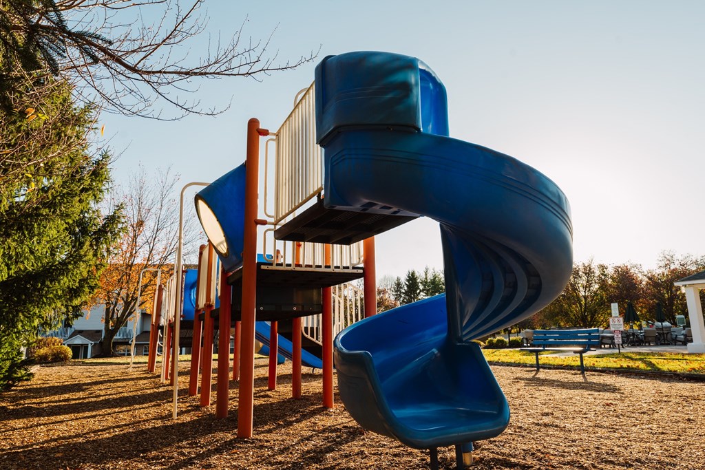 a slide at a playground at a park