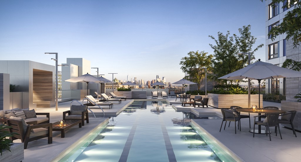 a rendering of a pool at a hotel with a city skyline in the background