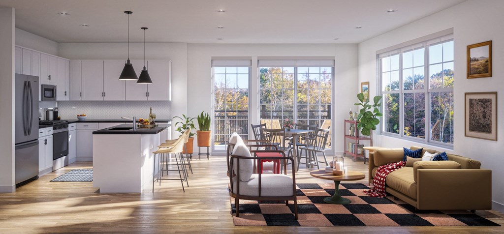 a living room with a kitchen and a dining room