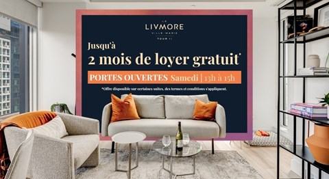 A living room with a couch, a chair, and a coffee table in front of a wall with a sign that says "LIVMORE".