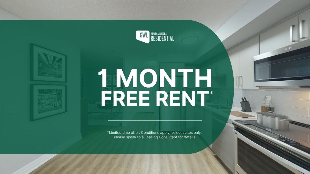 A kitchen interior with a sign offering 1 month free rent.
