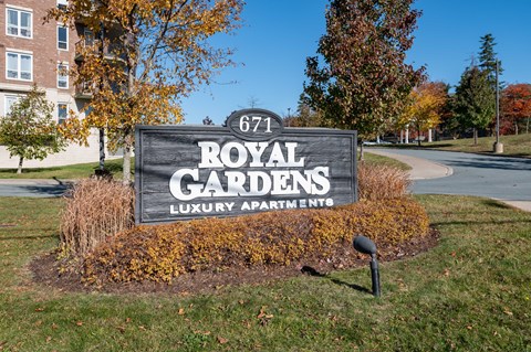 the sign at royal gardens luxury apartment building