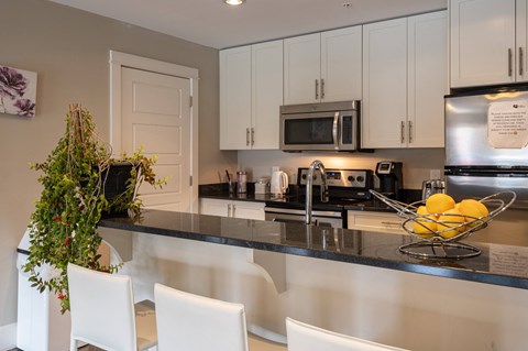 a kitchen with a counter top and a sink