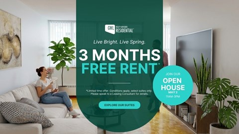 A woman is sitting on a couch in a living room with a sign offering 3 months free rent.