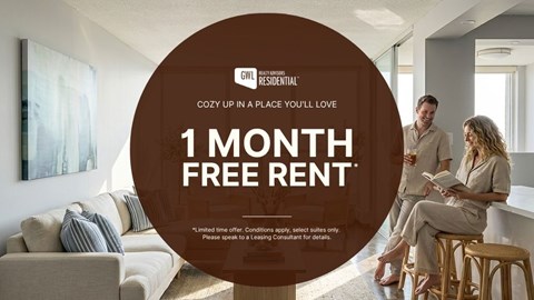 A man and a woman are sitting on a couch in a living room, with a large circular graphic in the foreground advertising a 1 month free rent offer.