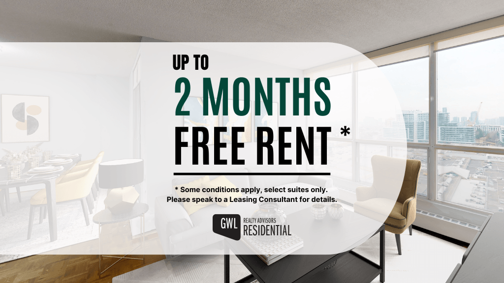 A room with a large window and a dining table with chairs, advertising a free rent offer.