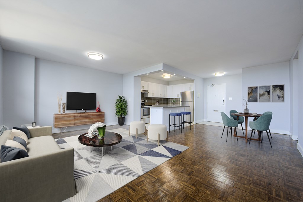 A living room with a wooden coffee table and a grey sofa.