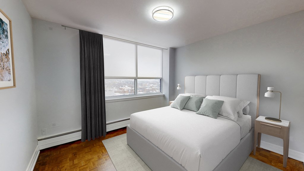 Bedroom with large bed and window