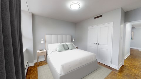 Bedroom with large bed and closet