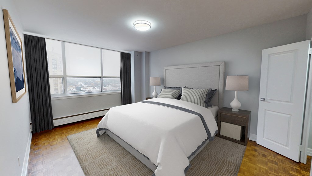 Bedroom with large bed and window