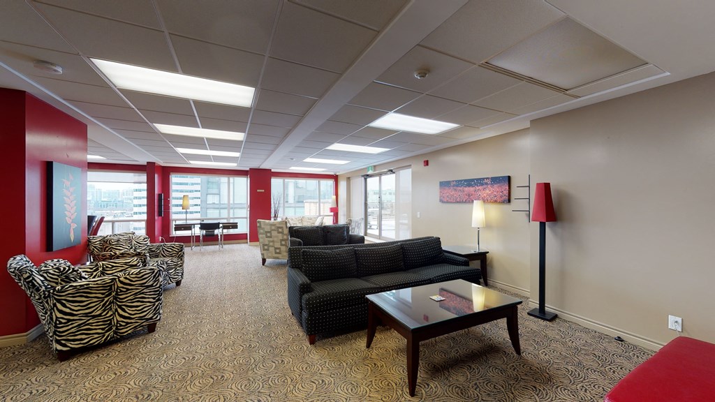 Social Room with sofa, chairs, and coffee table