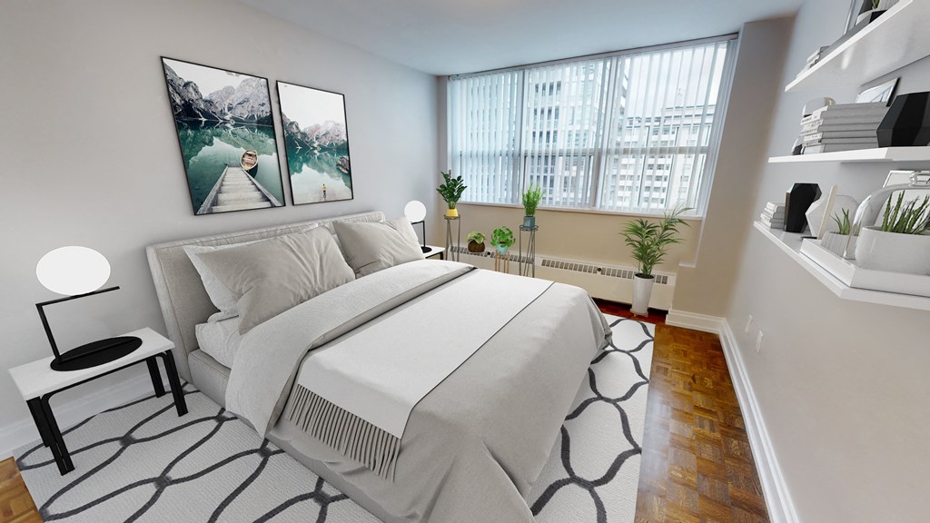 Bedroom with bed and large window