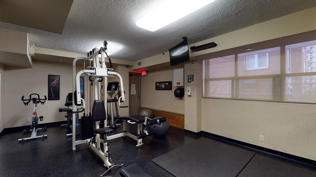 Fitness room with weights, workout mats