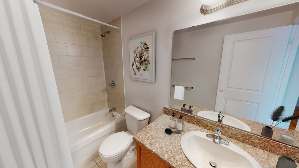 Washroom with bath, toilet and sink