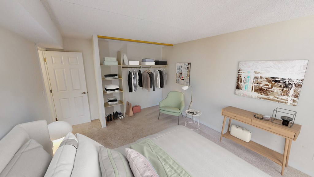 Bedroom with large bed and closet