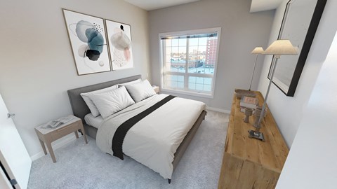 Bedroom with large bed and window