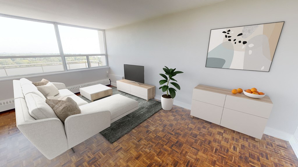 Spacious living room with TV and sofa. Thumbnail click to zoom