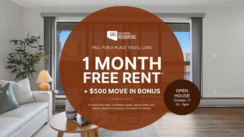 A living room with a couch and a sign offering free rent and a bonus.