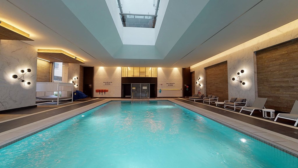 a swimming pool in the lobby of a hotel