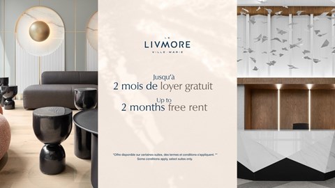 A modern living room with a sign offering free rent for two months.