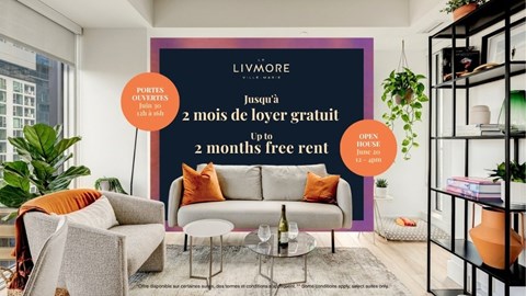 A living room with a sign offering free rent for two months.