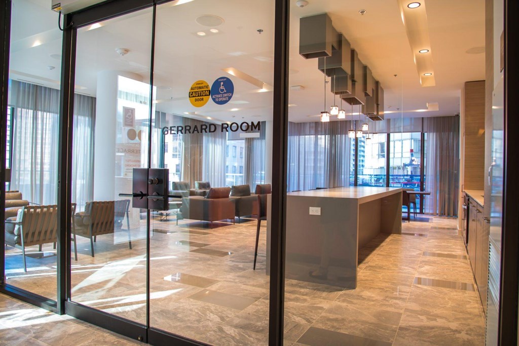 A glass door with a sign that says Gerrard Room.