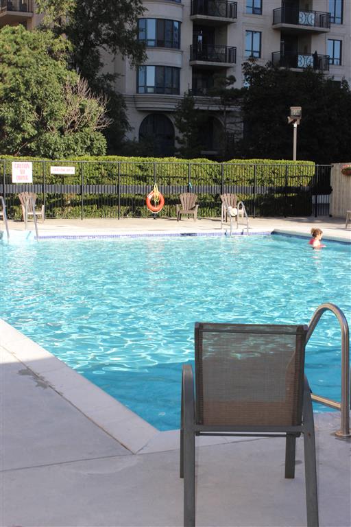 Outdoor pool with seating.  Thumbnail click to zoom.