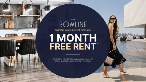 A woman is walking outside a building with a sign that says "1 MONTH FREE RENT".