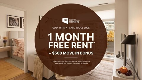 A room with a bed and a lamp, advertising a free rent offer.