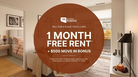 A room with a bed and a lamp, advertising a free rent offer.