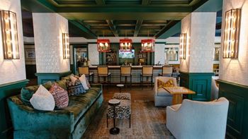 a living room filled with furniture and a bar at Kendall Park Too, Ohio, 43220