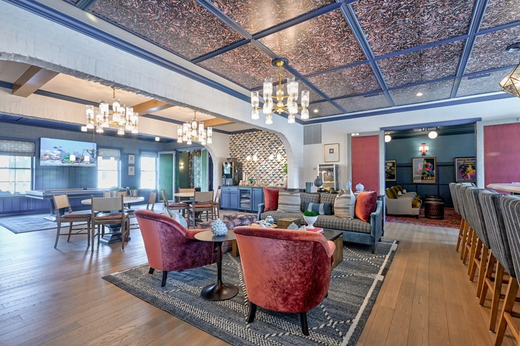 A large room with a lot of chairs and tables.