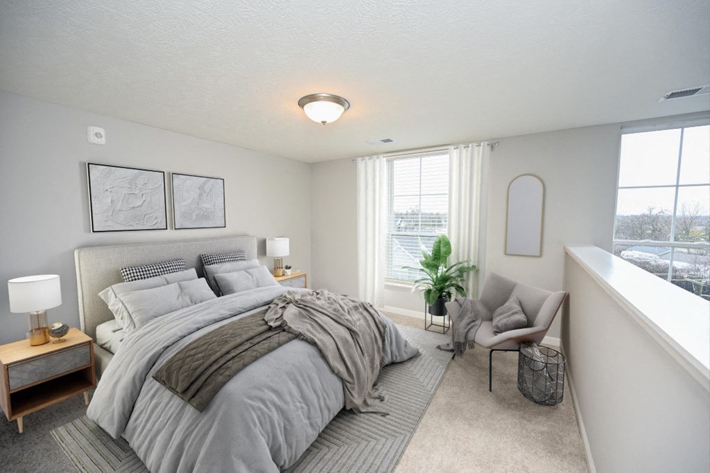 a bedroom with a large bed and a window at Kendall Park Too, Columbus