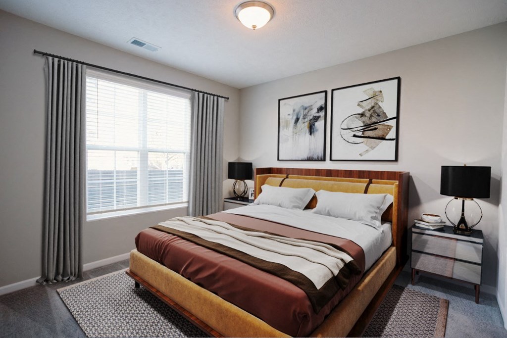 a bedroom with a bed and a large window at Elan Park, Columbus