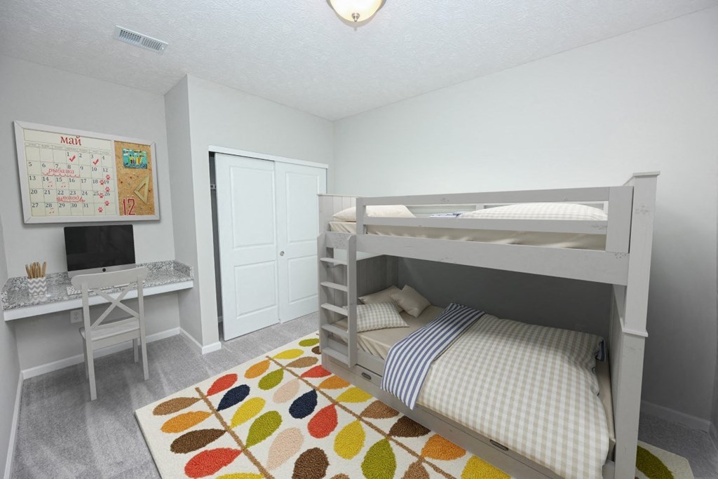 a kids bedroom with bunk beds and a desk at Elan Park, Columbus, OH 43231