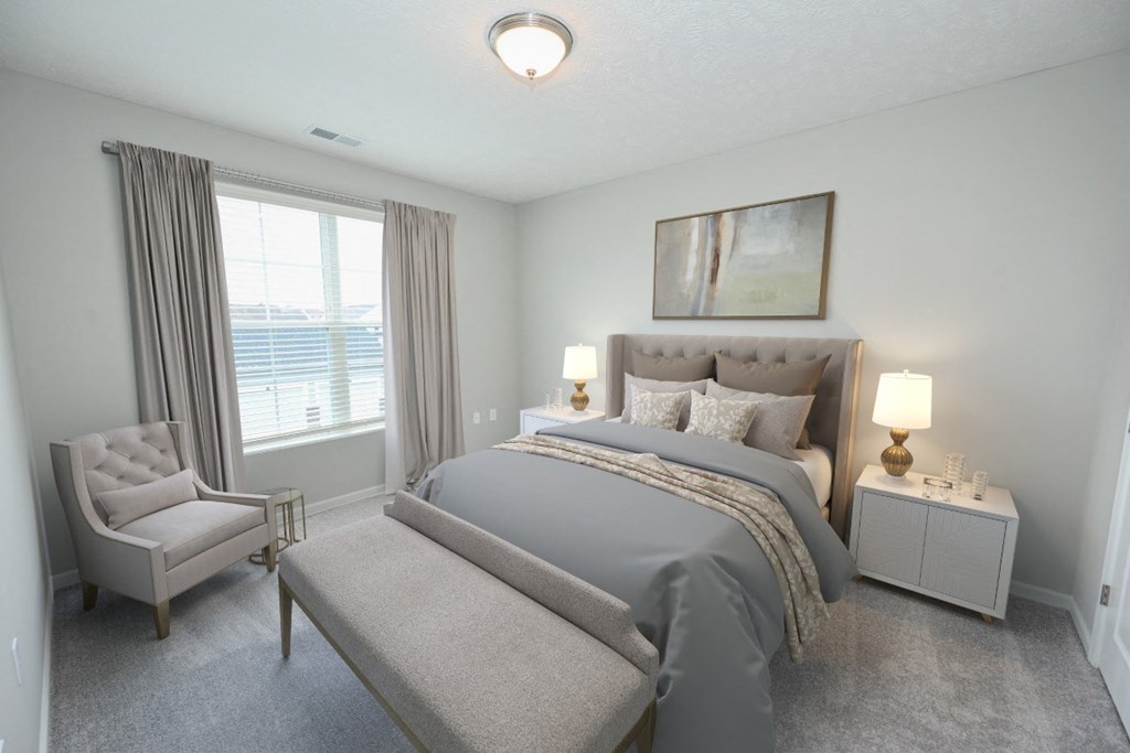 a bedroom with a bed and a chair and a window at Elan Park, Columbus, OH 