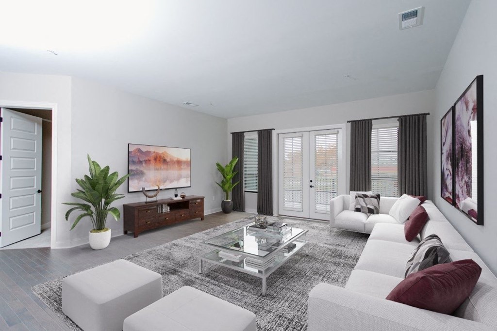 a living room with white furniture and a glass coffee table at Fairfax, Grandview, OH