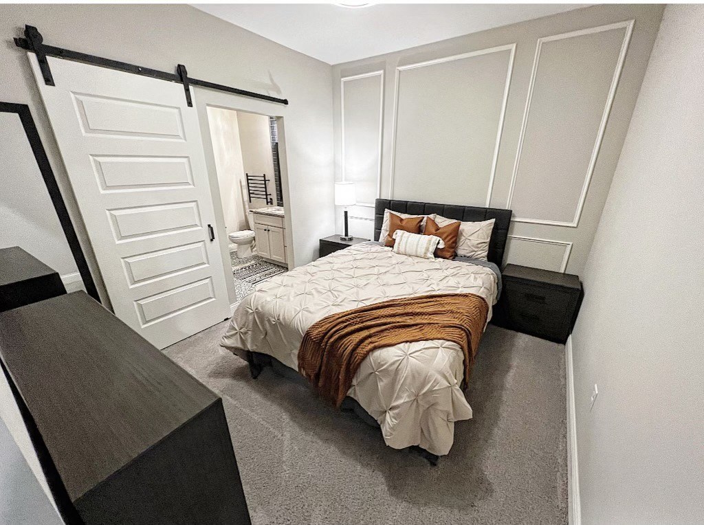 a bedroom with a bed and a dresser at Fairfax, Grandview, OH, 43212