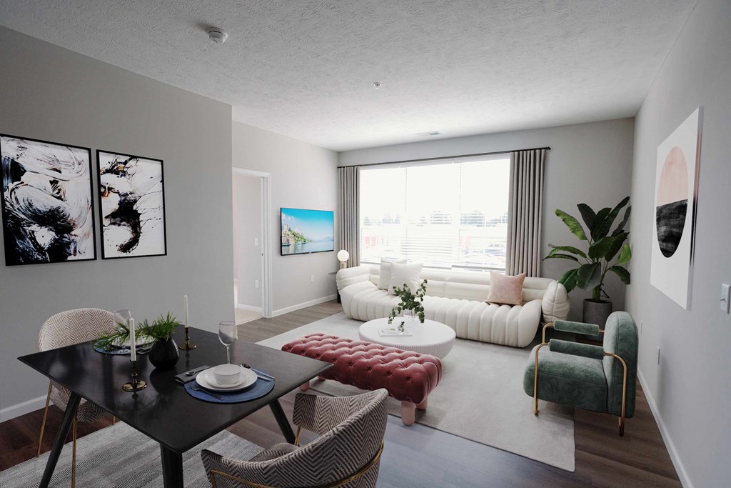 a living room with a couch and a tableat Kendall Park Too, Columbus