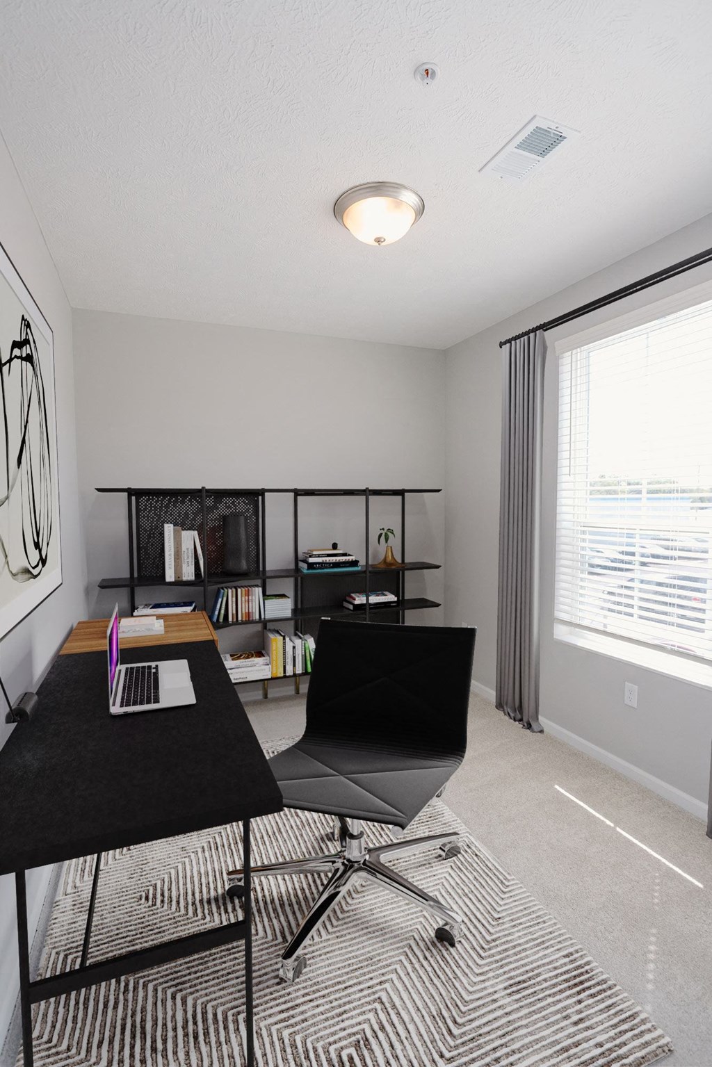 a home office with a desk and a large windowat Kendall Park Too, Columbus Ohio
