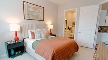 a bedroom with a bed and two night stands at Kendall Park Too, Columbus, 43220